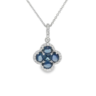 Sapphire and Diamond Floral Shaped Cluster Pendant in 18ct White Gold on a 9ct White Gold Trace Chain