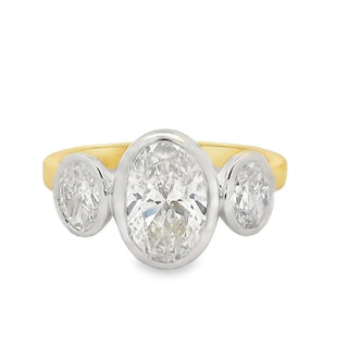 1.59ct Oval Three Stone Bezel Set Lab Grown Diamond Ring in 18ct Yellow Gold