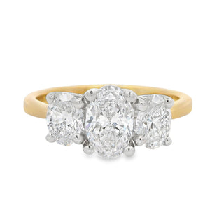 0.71ct D VS1 Oval Cut Three Stone Diamond Engagement Ring in 18ct Yellow Gold
